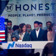 Jessica Alba, co-founder and chief creative officer of Honest Co., and Nick Vlahos, chief executive officer of Honest Co., ring the opening bell during the company’s initial public offering (IPO) at the Nasdaq MarketSite in New York, U.S., on May 5, 2021.